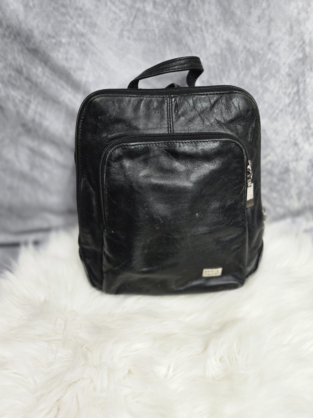vintage Wilsons Leather Pelle Studio Black Leather Slim Backpack